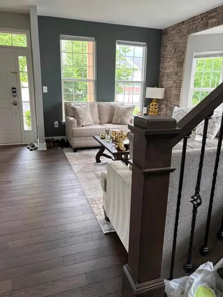 Front hallway and staircase with hardwood floors cleaned